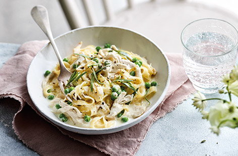 Milk-poached chicken with peas and pasta