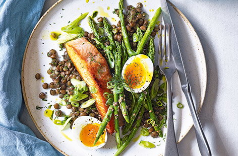 For an easy fish dinner that's ready in just 30 minutes, look no further than this roast salmon recipe with lentils and asparagus