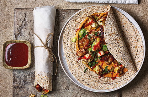 Run out of lunch ideas? Once you try this Thai-style wrap is sure to become a new favourite. The moreish lime, sriracha and peanut butter sauce is topped with chicken, cauliflower and spring onions for a real flavour sensation.