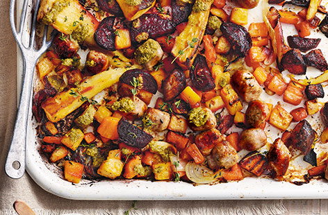 With a rainbow of earthy root veg and succulent pork sausages, this tasty traybake recipe is the perfect winter comfort food