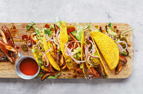 Chef Derek Sarno has created these delicious vegan mushroom tacos, perfect for a Mexican sharing feast. Stuff tacos with onions, mushrooms and jalapenos and top with generous spoonfuls of smashed avocado.