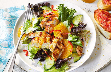 This Spanish-inspired chicken recipe is the perfect summer salad. Classic Spanish tomato bread is an easy accompaniment to the juicy griddled chicken and fresh green salad tossed in a zesty orange dressing for a vibrant midweek meal.