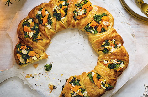 For a vegetarian main with a difference, try this delicious croissant pastry wreath that's bursting with sweet butternut squash, roasted garlic and crumbly salad cheese.