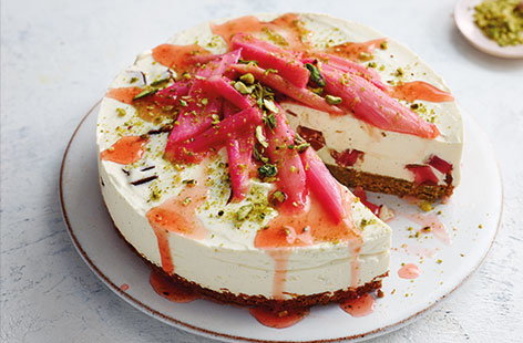 With a pistachio biscuit base, jewels of Turkish delight and sweet baked rhubarb, this beautiful vanilla cheesecake has really got the wow-factor