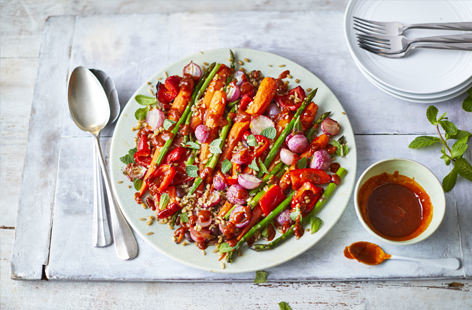 This vegetarian bowl is a celebration of Spring flavours. With tendersweet carrots, asparagus and mint and tossed with a punchy harissa and honey dressing, this makes an ideal midweek meal.