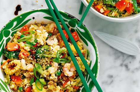 Spruce up your midweek meals with this delicious take on fried rice. Fluffy cauliflower rice is stir-fried with crunchy veggies, rich spices and juicy prawns in this exciting main - and whatsmore, it can be on the table in just 20 minutes