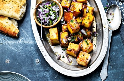 Enjoy a real taste of India with this street-food inspired side dish. Creamy paneer is a much-loved vegetarian ingredient and works wonderfully when lightly fried in fiery chilli and earthy cumin and paired with a crisp red onion and mint salad