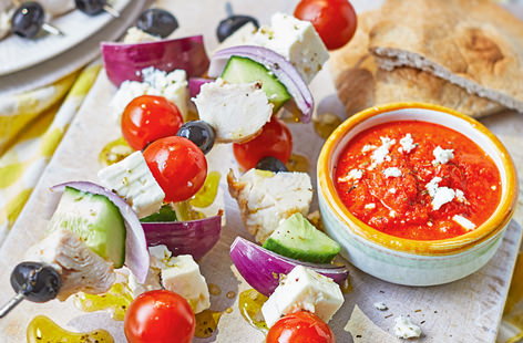 These inventive Greek salad kebabs are the perfect weeknight supper for two. This assembly-only recipe means that no time is wasted in the kitchen - simply blitz up the red pepper dip, construct your kebabs and enjoy