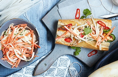 The classic chicken sandwich has been given a delicious makeover – succulent chicken, lightly griddled in a sticky barbecue sauce and served in a fresh baguette. Top with a homemade slaw, packed with peppery mooli and sweet carrot