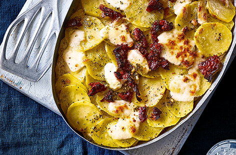 Try this French potato gratin recipe with an added pesto and basil kick for a mouthwatering twist on a classic. Layers of potato, gooey mozzarella cheese and tangy sundried tomatoes makes this the perfect crowd-pleaser.