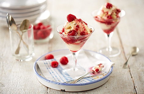 A cranachan is a traditional Scottish dessert and this quick and easy riff on it deserves to take up some table space at your next dinner party. The pretty layers of ice cream, raspberries and toasted oats should be served up your finest sundae glasses.