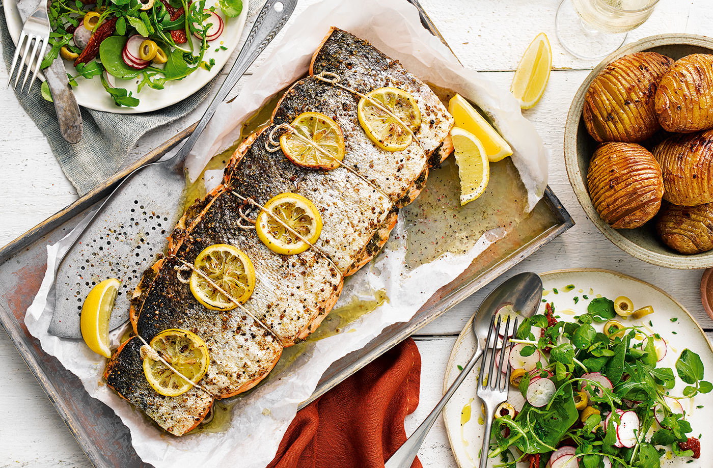 Roast salmon with hasselback potatoes