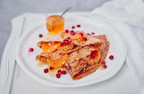 These spelt pancakes have a delicious sweet and nutty flavour. Serve them with a cardamom and clementine syrup and fresh pomegranate seeds for a fruity Pancake Day dish.