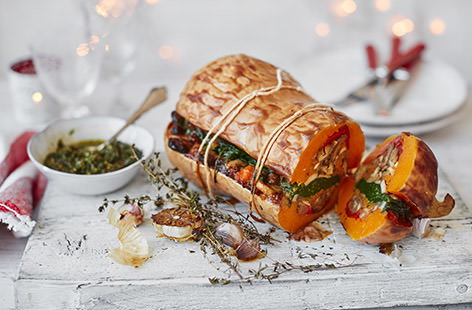 Prepare this stunning centrepiece to impress your vegan guests on Christmas day. Roasting a whole butternut squash, scooping out the sweet flesh and then filling with layers of chargrilled peppers, mushroom, chestnuts and spinach is really easy to do