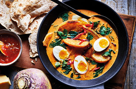 Brighten up dinnertimes with this vibrant veggie curry, made with earthy swede, tikka paste and creamy coconut milk