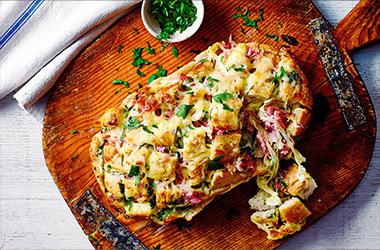 Tear-and-share cheesy ham and garlic bread