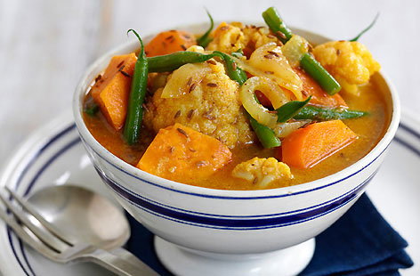 If you want a curry in moments, keep it veggie. This cauliflower, sweet potato and coconut curry is speedy, satisfying and fragrant thanks to its use of delicious, ready-made curry paste. The chopped green beans added towards the end of cooking bring colour and crunch.